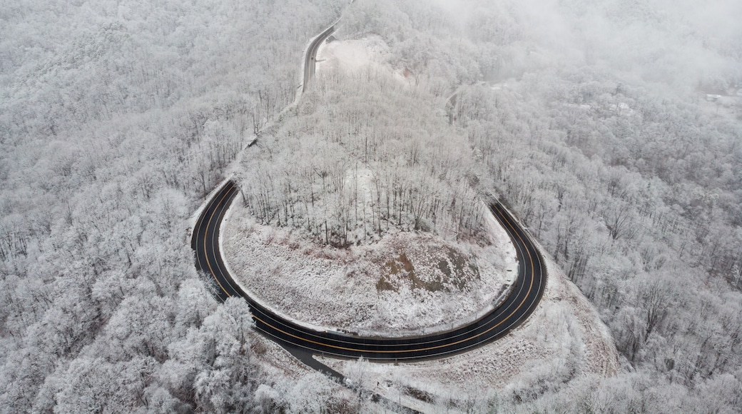 Aerial View of Winding North Carolina Mountain Road in the Snow