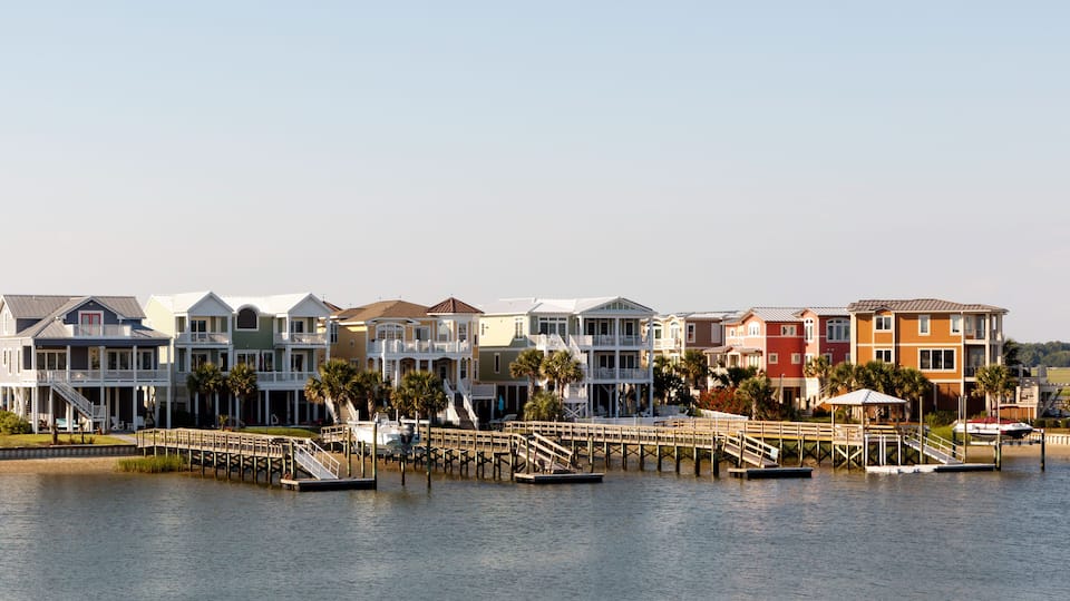 Wide angle view of luxury beach rental houses on the intercoastal waterway, Sunset Beach, North Carolina