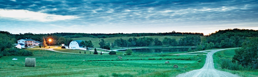 Panorama of a farmstead in the hills of the turtle mountains of North Dakota