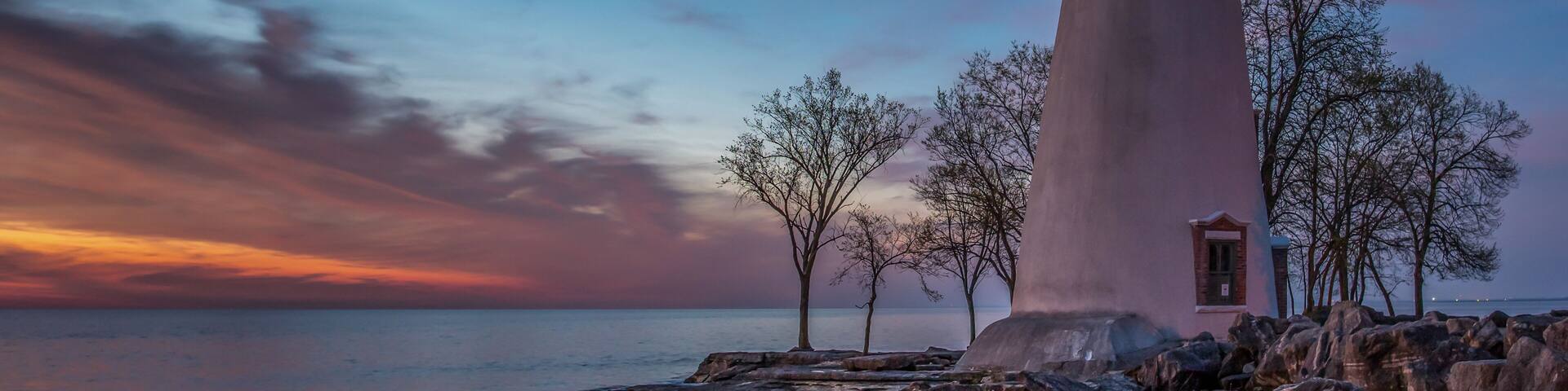 Marblehead Lighthouse at sunrise with beacon shining