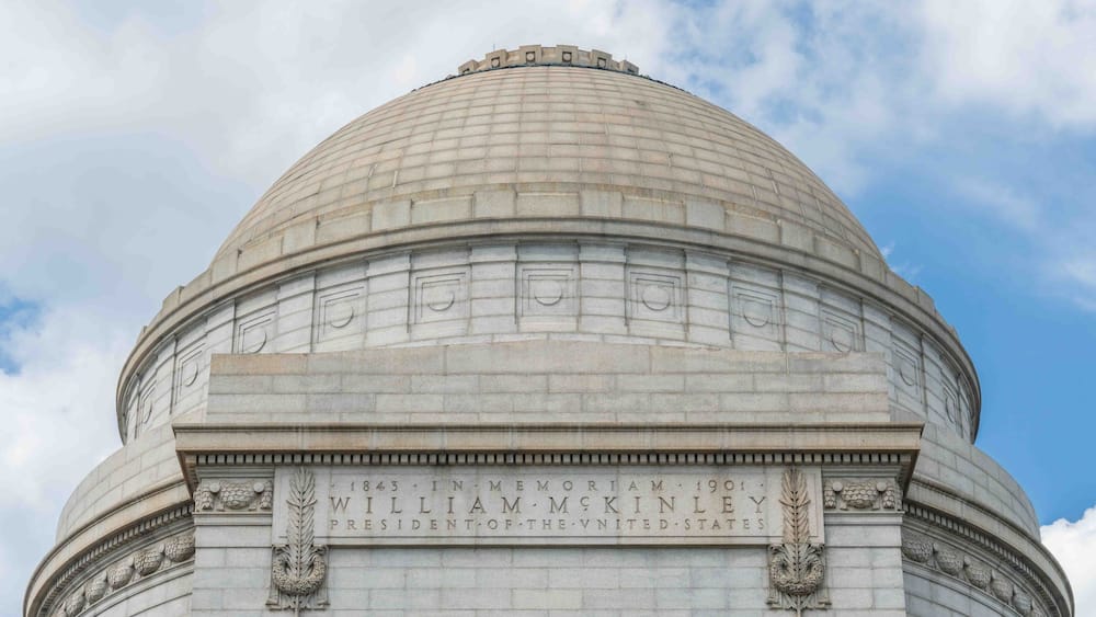 A large stone dome with inscriptions commemorating President William McKinley.