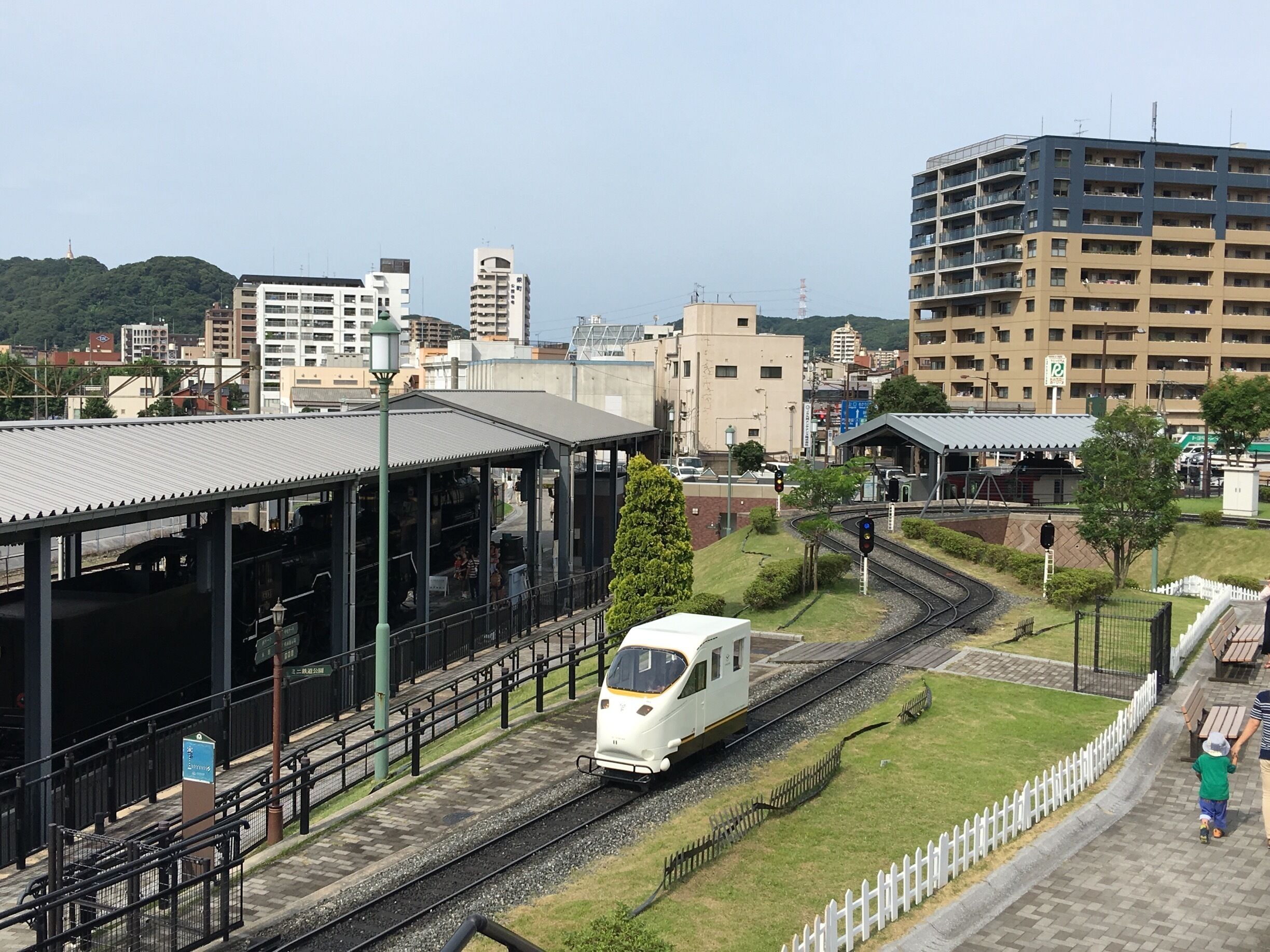 In the railway museum of Kokura children have fun in these tiny trains as conductors and operators.