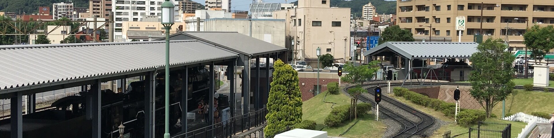 In the railway museum of Kokura children have fun in these tiny trains as conductors and operators.