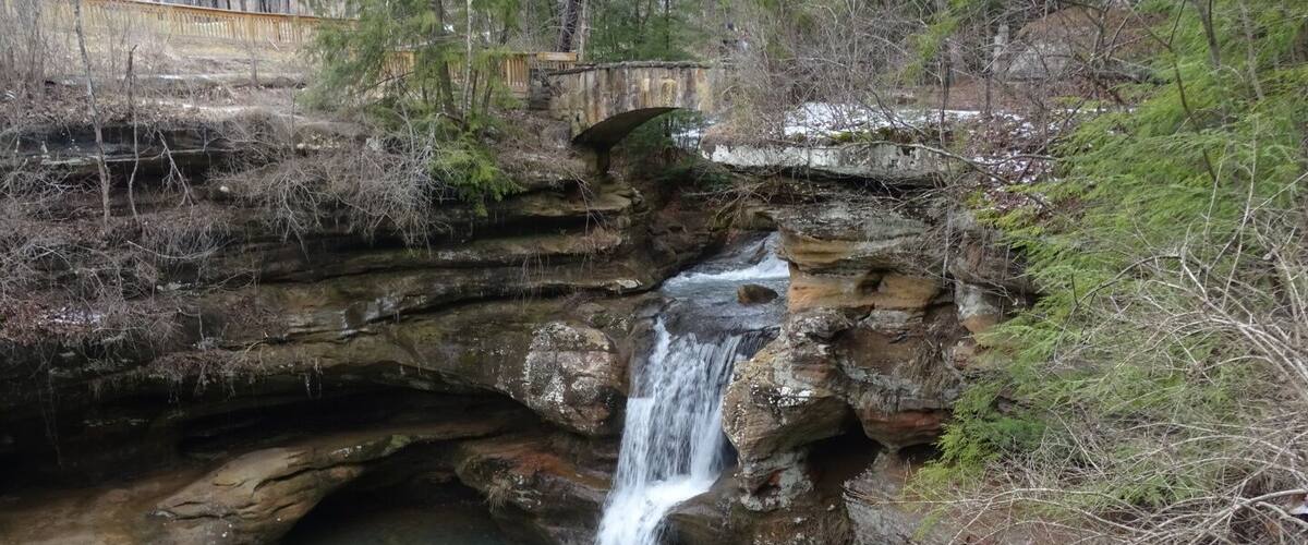 The upper fall at Old Man's cave are likely the most well known and photographed in the park.
If you want to see the falls at their peak, head there in late winter/early spring just as the snow melts and preferably after a heavy rain fall. Also if your schedule permits, head there on a weekday morning and you just might have the place to yourself for a bit.
Old Man's Cave derives its name from the hermit Richard Rowe who lived in the large recess cave of the gorge. Rowe lived out his life in the area and is buried beneath the ledge of the main recess cave.