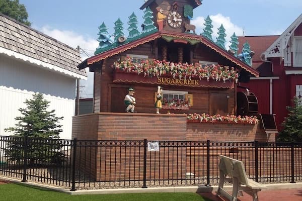 World's largest Cuckoo Clock in Sugar Creek, Ohio. When it chimes, little puppets come out one door and play a song, then go back in the other door.