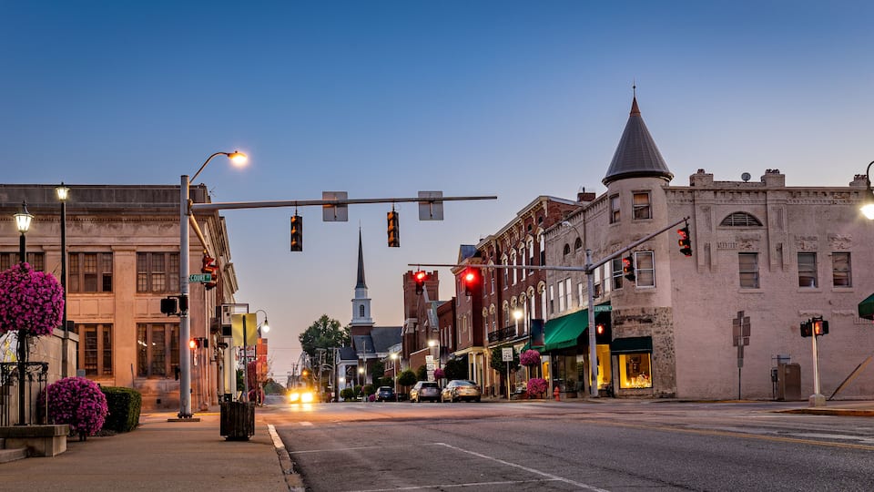 Scarce traffic on Main Street in downtown Woodford county's Versailles, KY during sunrise