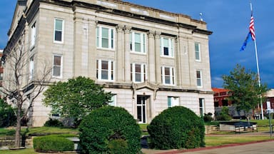 Side view Creek County Courthouse stormy morning historic downtown Sapulpa, Oklahoma. Route 66 Greco/Greek Revival style of architecture. Small town USA.