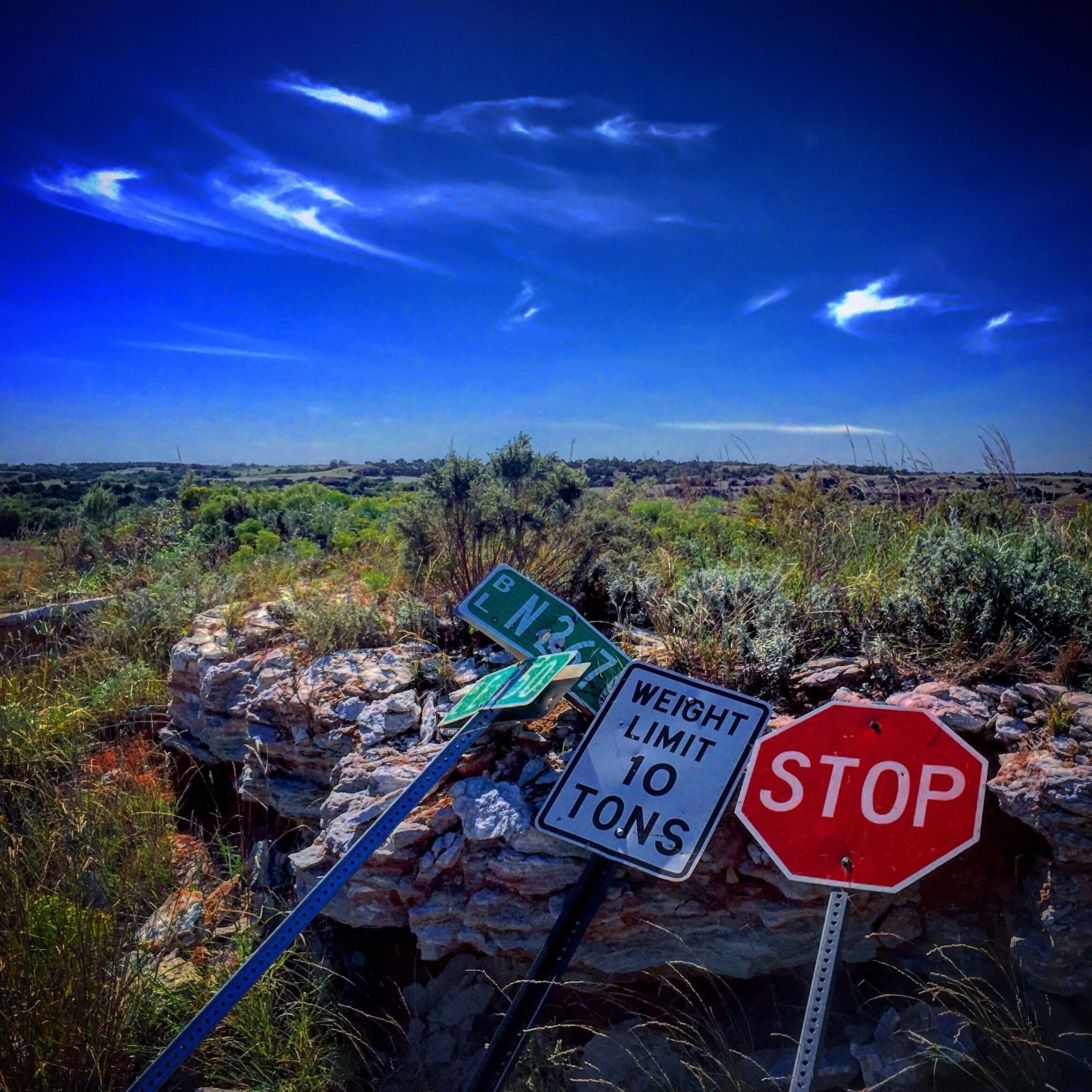 Nice little hill to climb, a practical joker drug these county signs to the top. 