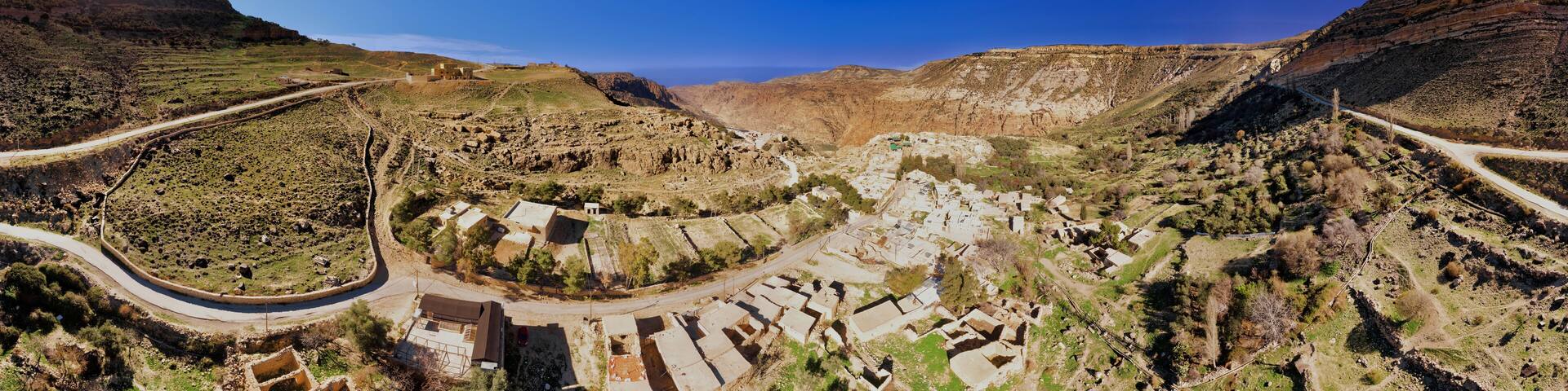 Composite high-resolution panorama of the Dana Village narby the Dana Reserve, a 1000-metre deep valley cut in the south-western mountainous region of the Kingdom of Jordan.