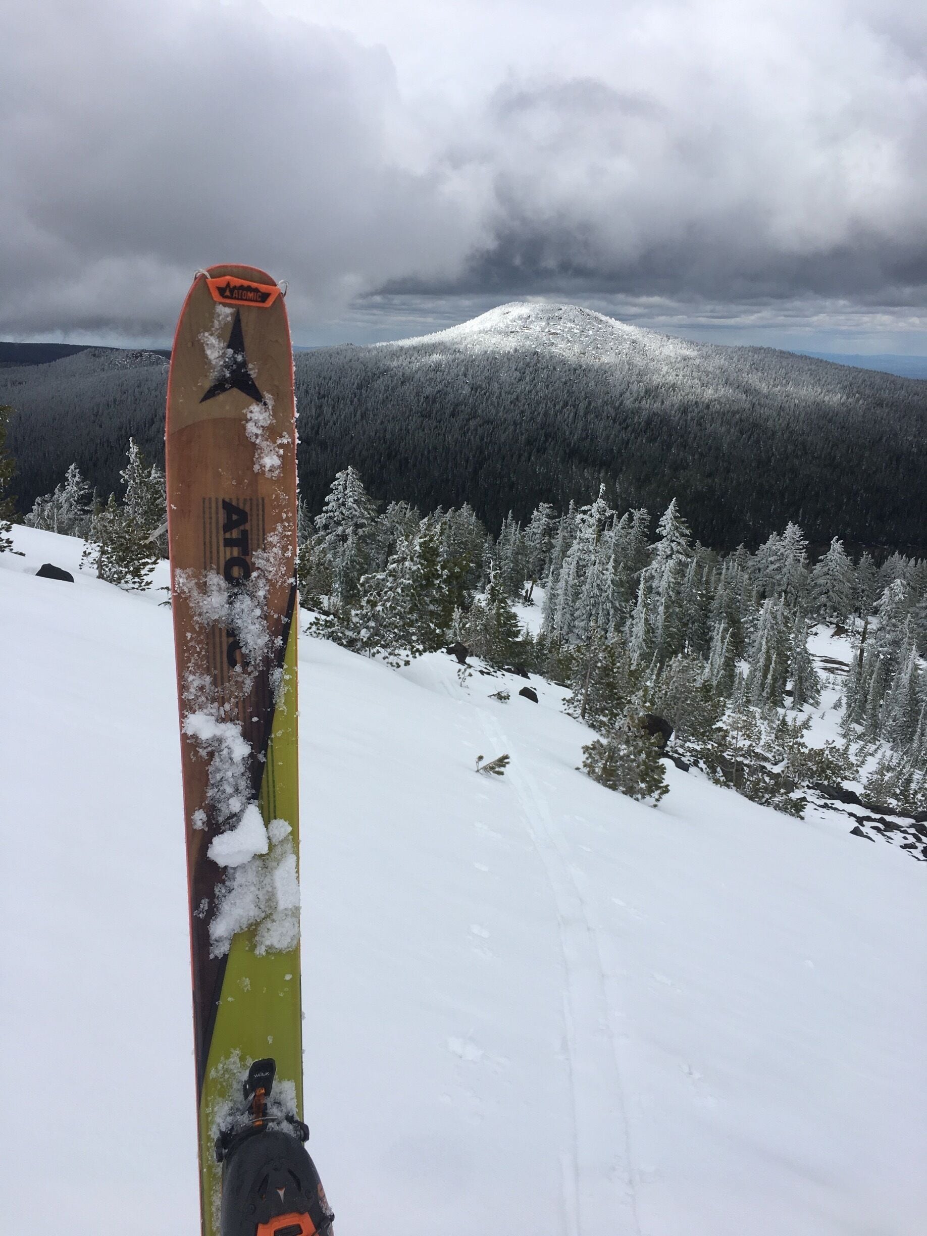 The ski tour up Bachelor Butte is short and sweet with amazing views. ❄️ This photo is about halfway up looking across towards Tumalo Butte! Snow conditions were still amazing after the mountain closed in June! #mountain #skiing #winter