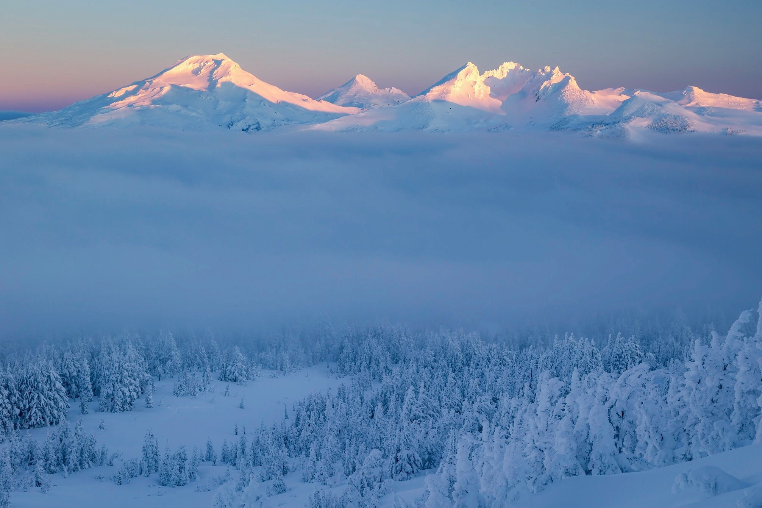 Skinned up here in complete darkness and single digit temps to find this sunrise view of The Sisters and Broken Top. Sweat had frozen in my beard and my toes were numb, but it was so worth it. Not to mention the incredible ski down in deep pow! #adventure #snow #winter #snowscape
