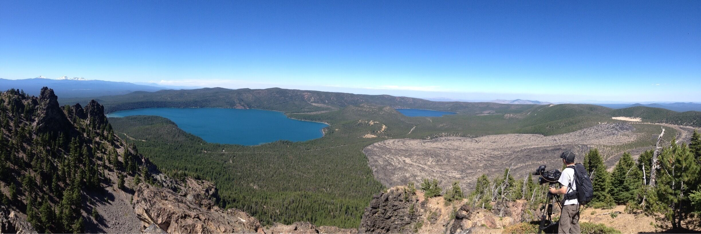 This is just a few miles from my home.  As you stand atop Paulina Peak, you can see Paulina Lake to the west, East Lake to the East and the Obsidian flow making it's way toward the two. This is overlooking the Newberry Caldera National Monument.