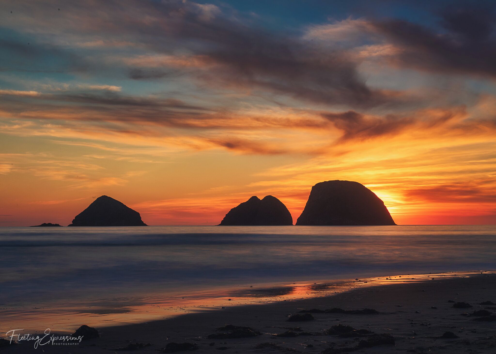 Sunsets on the Pacific Ocean are just breathtaking! I went to the beach to capture one last sunset before we moved on and mother nature brought out one of her best! 