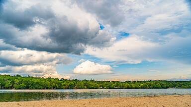 Blue sky and Clouds over a Eagle Lake, Gouldsboro, Pennsylvania