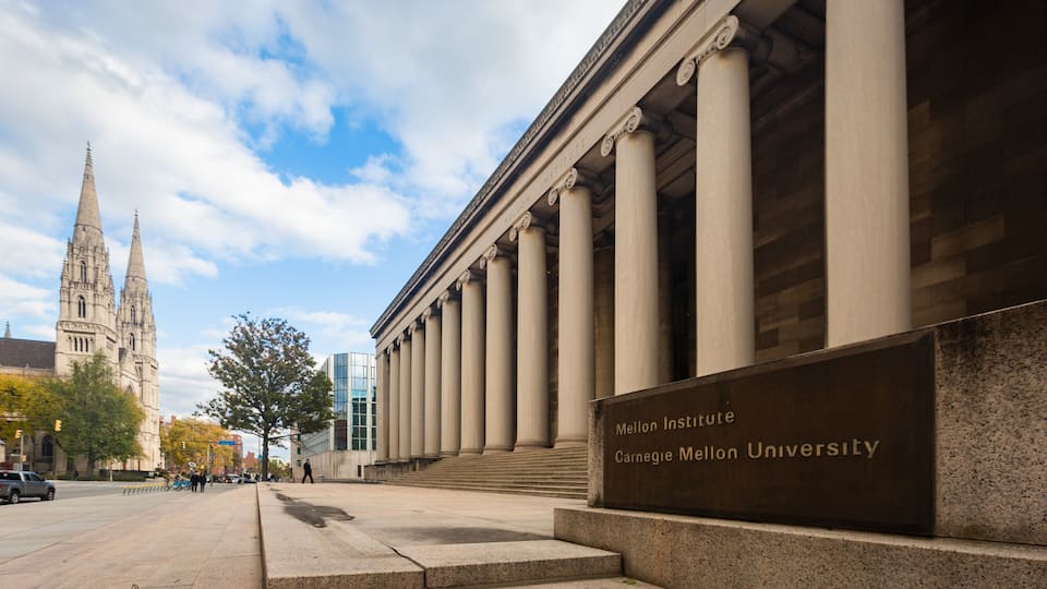 Oakland showing an administrative buidling, heritage architecture and signage