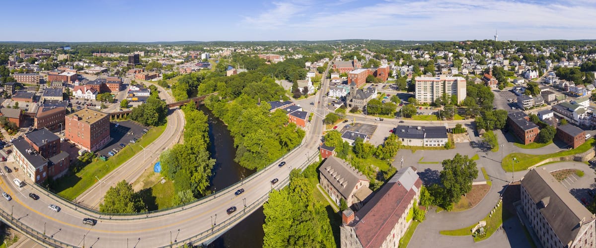 Blackstone River and Woonsocket Main Street Historic District panorama aerial view in downtown Woonsocket, Rhode Island RI, USA.
