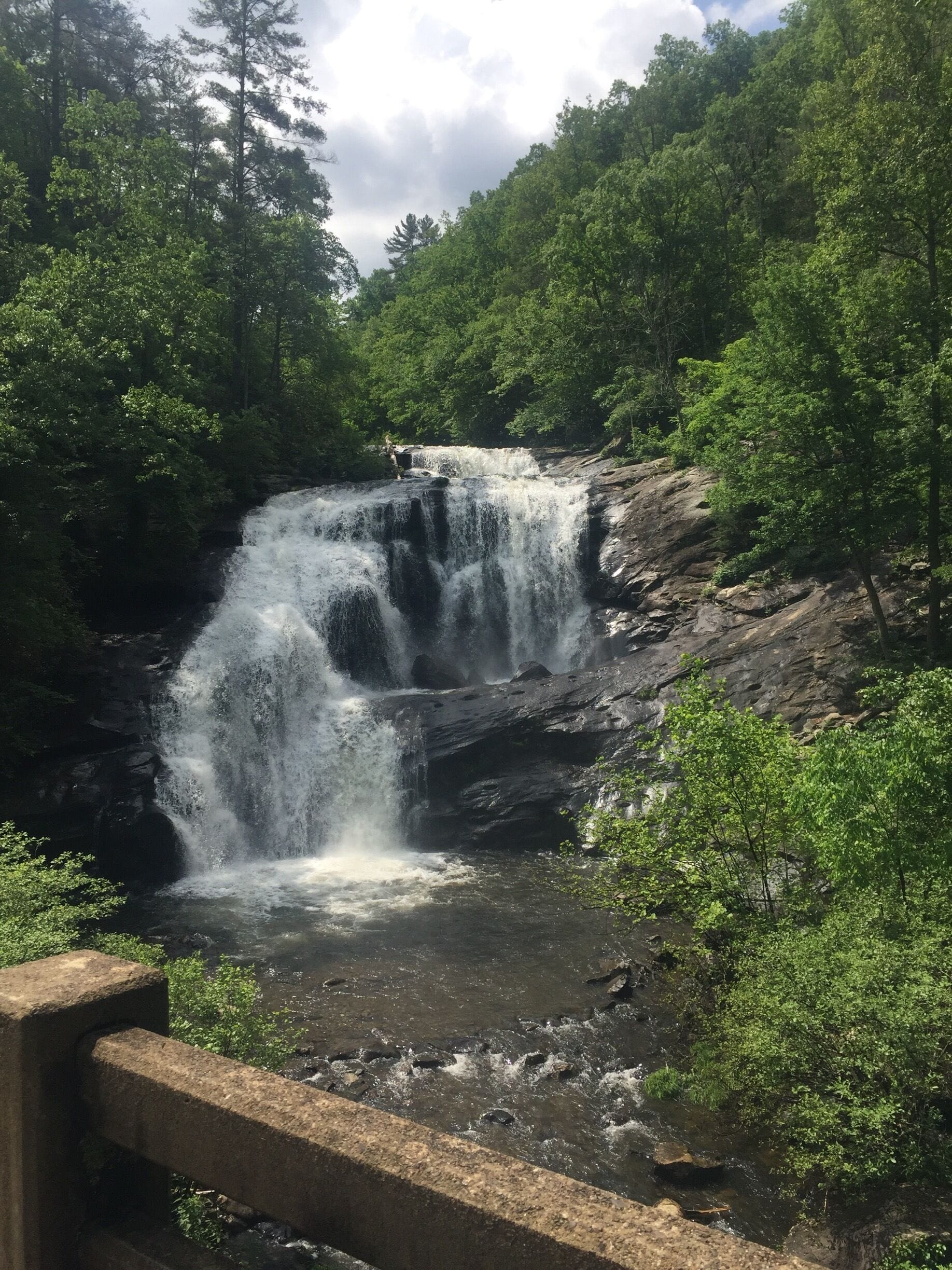 Parking area is just past the falls. Can be pretty crowded on the weekends but it is beautiful!