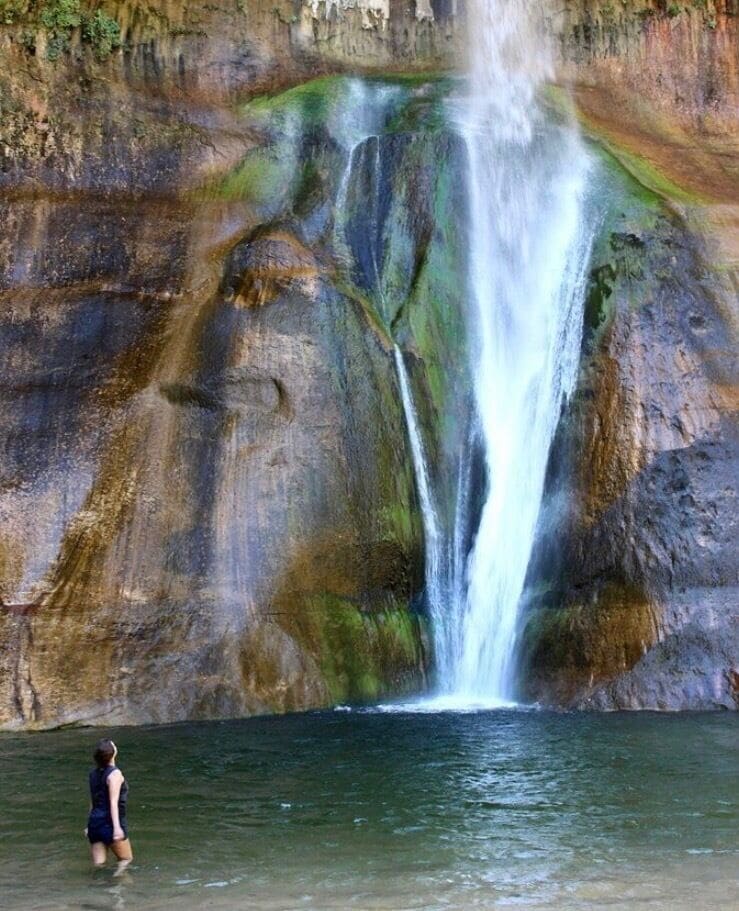 A waterfall cascading down a rocky cliff.