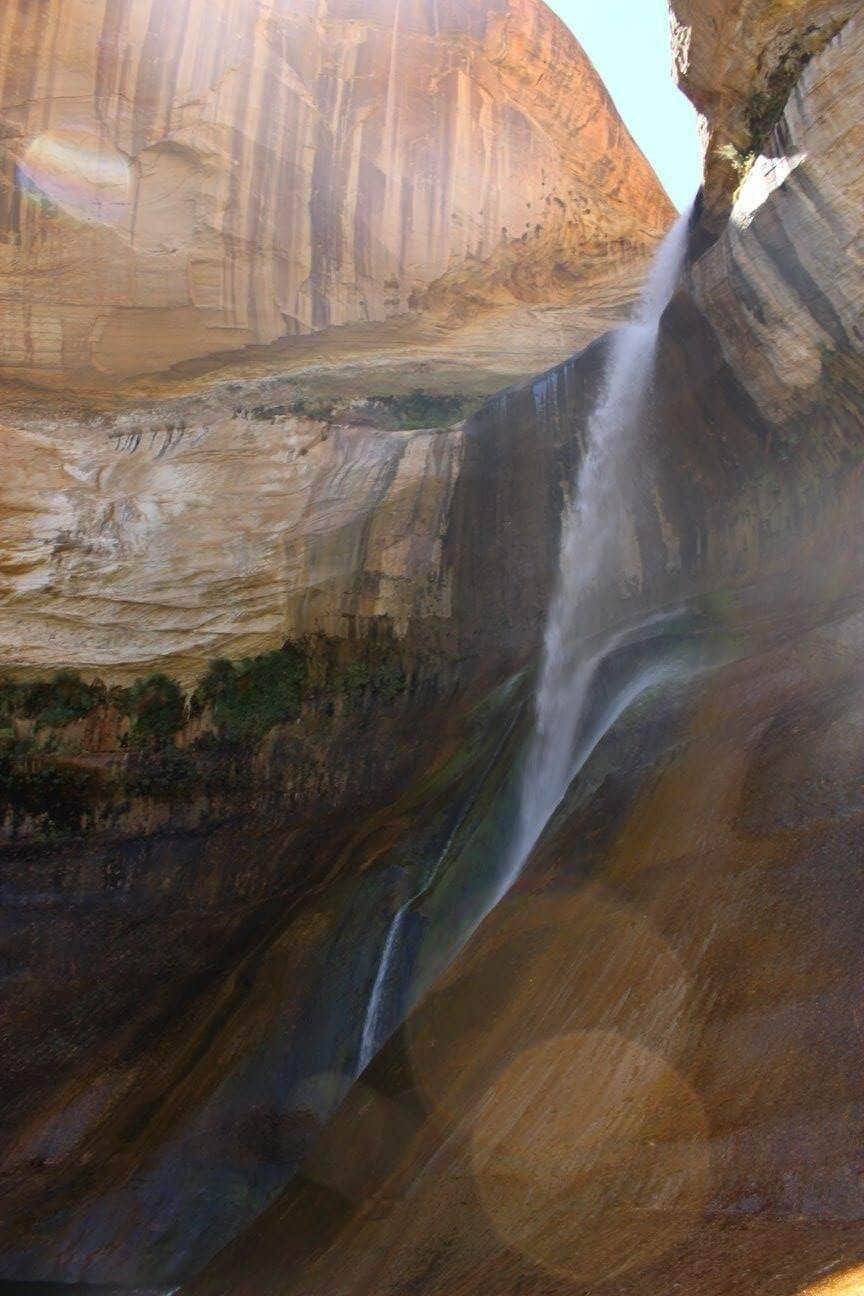 A waterfall cascading down a steep cliff.