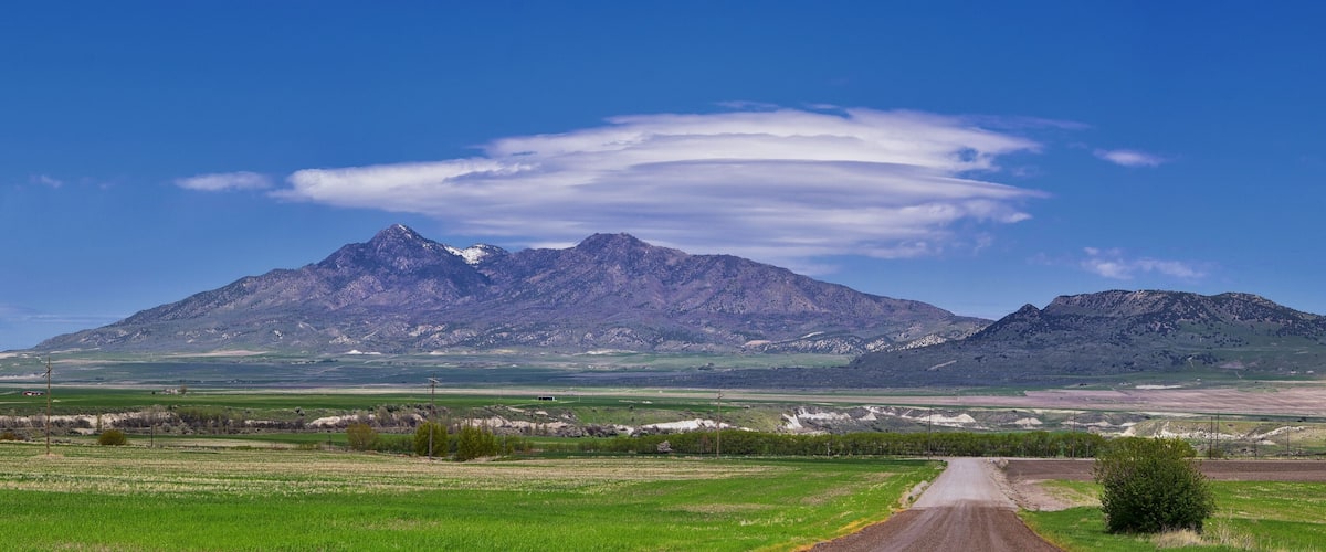 Tremonton and Logan Valley landscape views from Highway 30 pass, including Fielding, Beaverdam, Riverside and Collinston towns, by Utah State University, in Cache County along the Wasatch Front Range