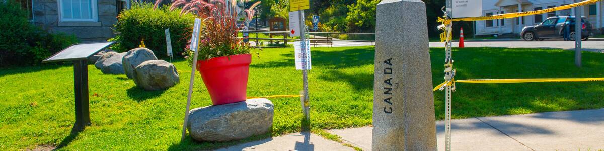 Border sign of Canada and USA between town of Derby, Vermont, USA and Stanstead, Quebec, Canada.