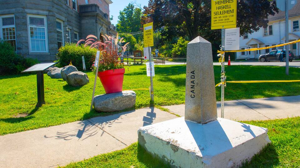Border sign of Canada and USA between town of Derby, Vermont, USA and Stanstead, Quebec, Canada.