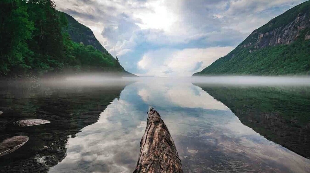 this is a pretty cool spot in vermont the willoughby lake with the mount pisgah just beside . cristal clear green water ! worth the ride ;)