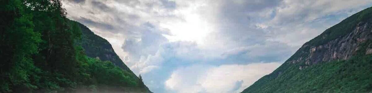 this is a pretty cool spot in vermont the willoughby lake with the mount pisgah just beside . cristal clear green water ! worth the ride ;)