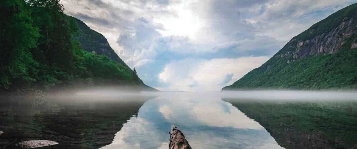 this is a pretty cool spot in vermont the willoughby lake with the mount pisgah just beside . cristal clear green water ! worth the ride ;)