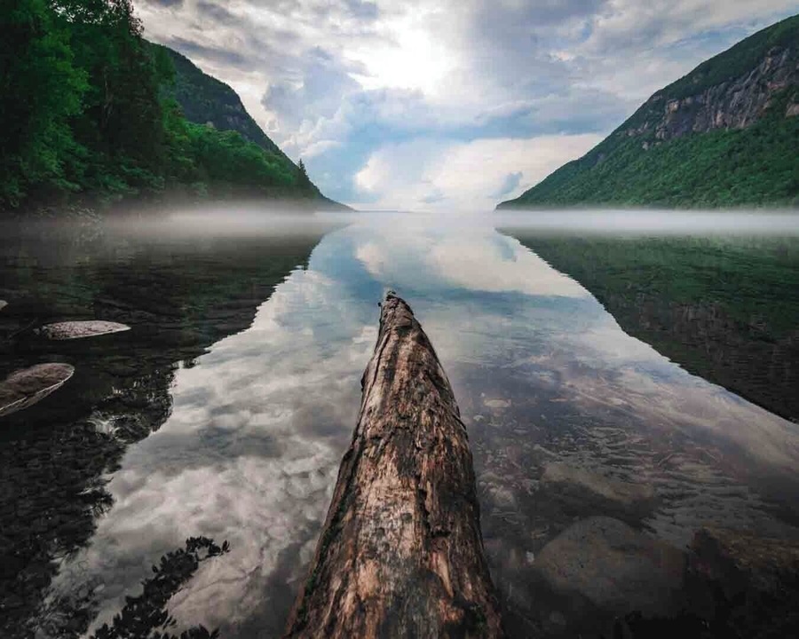 this is a pretty cool spot in vermont the willoughby lake with the mount pisgah just beside . cristal clear green water ! worth the ride ;)
