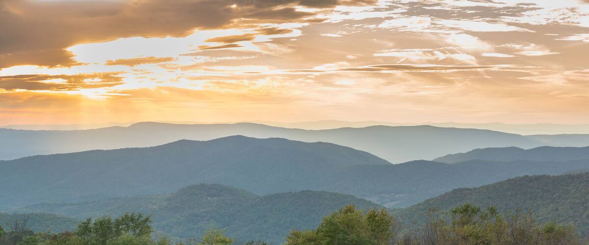 A mountain range with a sunset.