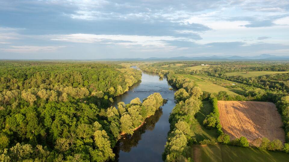 Aerial View of the Forest and Farmland Around the James River in Virginia Near Scottsville