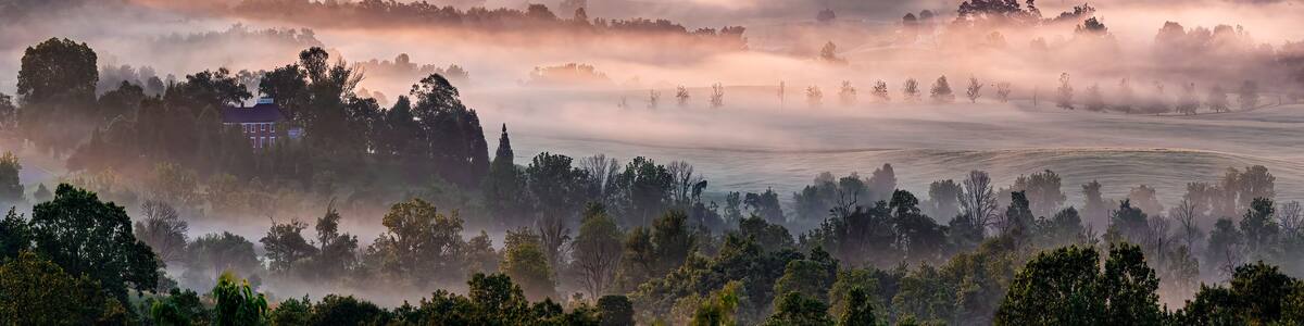 Misty valley in early morning in Albemarle County, Virginia, in late spring.