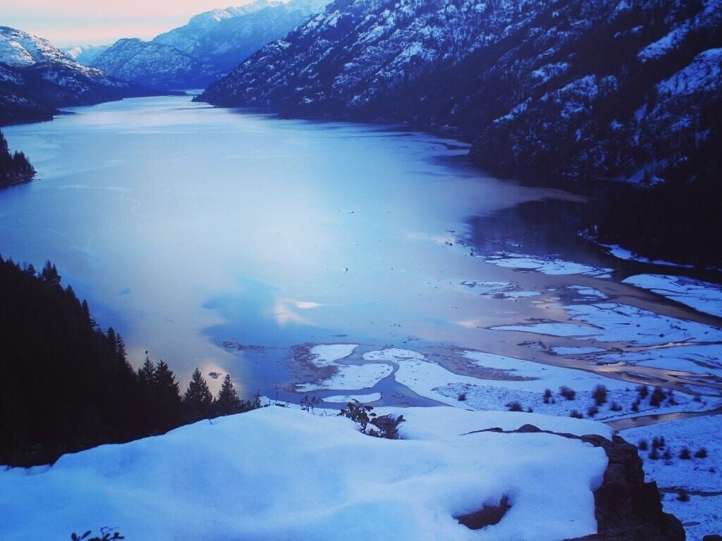 Winter closes in on the head of Lake Chelan at Stehekin. The Lake level is 22 feet below summer time levels for electrical generation purposes.