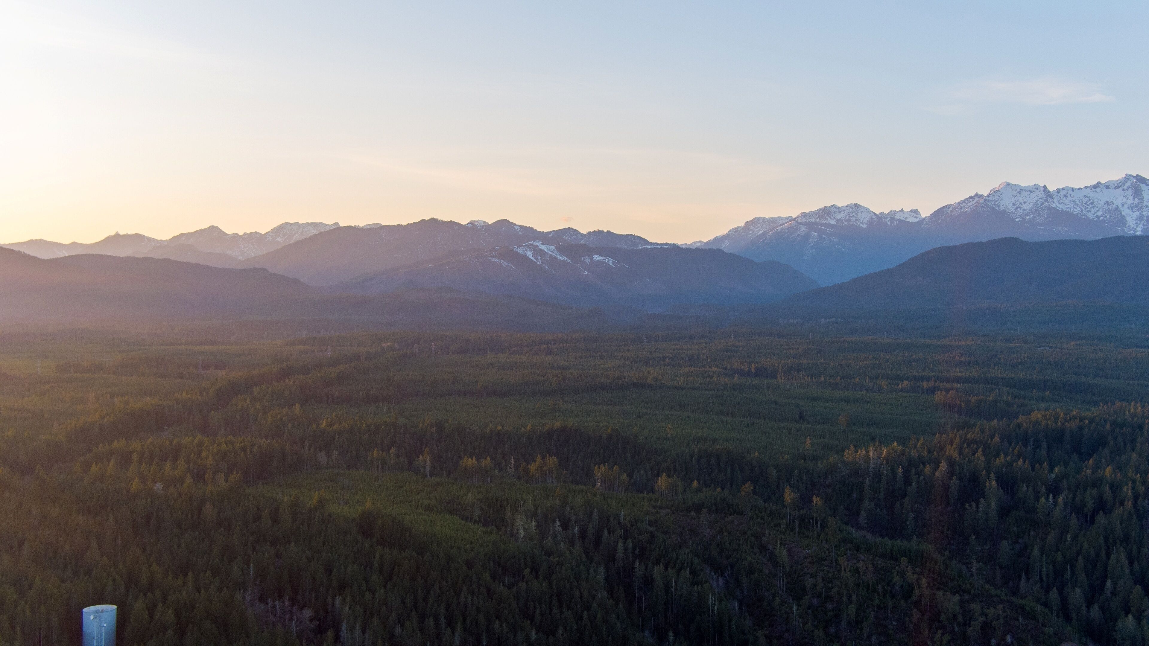 Aerial view of the Olympic Mountain Range of Washington State at sunset
