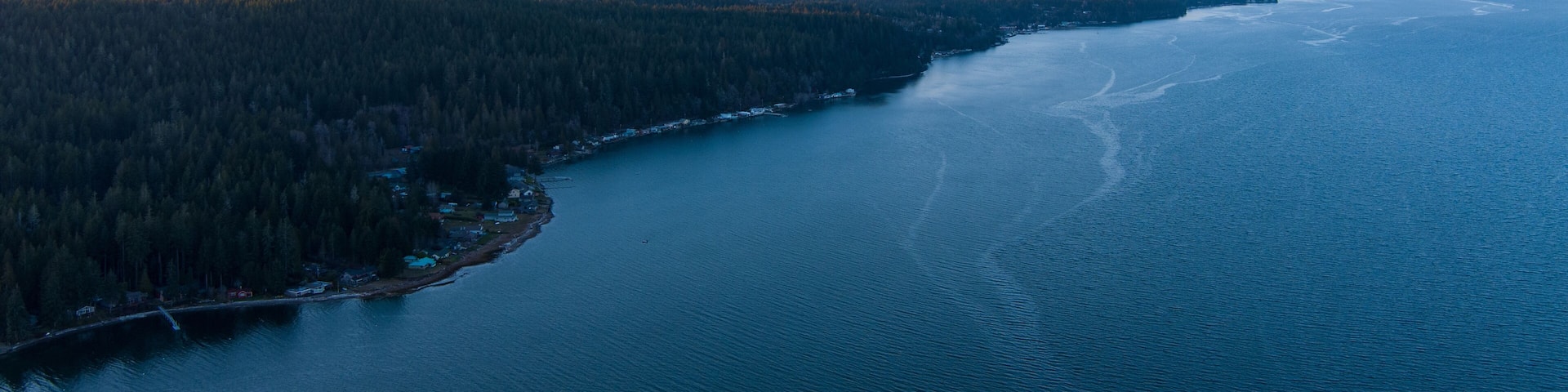 Aerial view of the Puget Sound and the Olympic Mountains of Washington State at sunset
