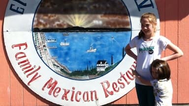 If you've ever eaten Mexican or even seen a Mexican...do not eat here. Go scavenger oysters on the beach.