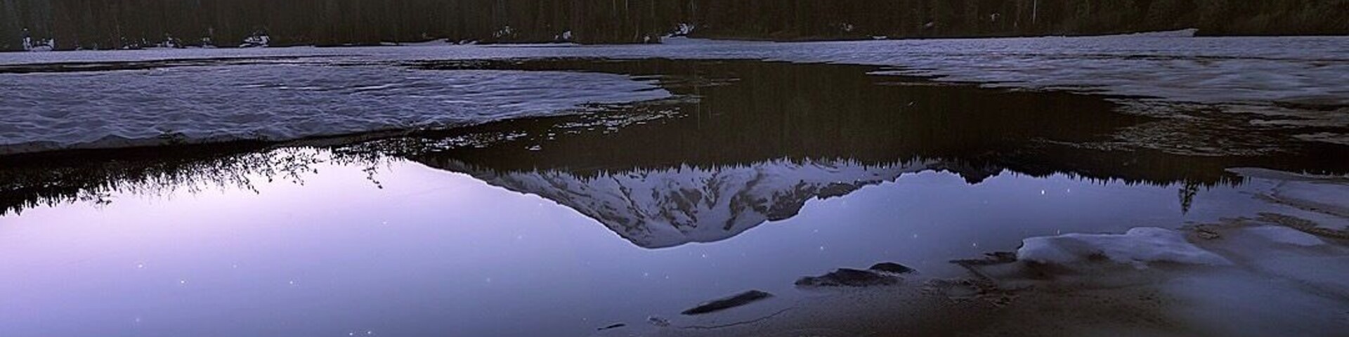 Tahoma in Twilight. Shot from Reflection Lake at Mount Rainier National Park. Bonus points if you can you spot the climbers headlamps up on the mountain:)