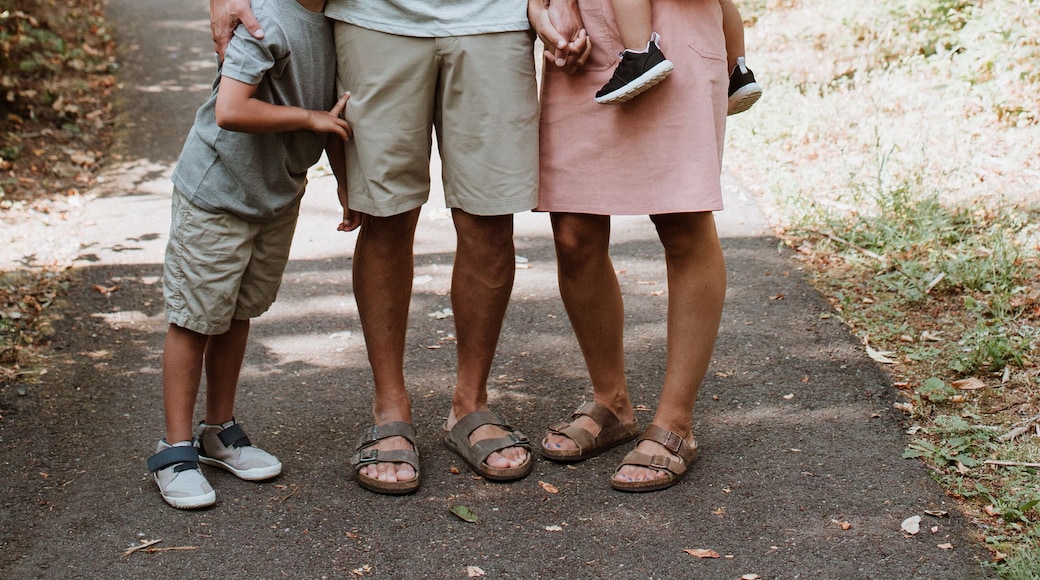 Portrait of Happy Family on Trail