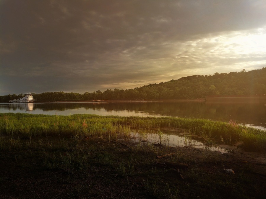 Barge heading into the sunset on the Ohio River.