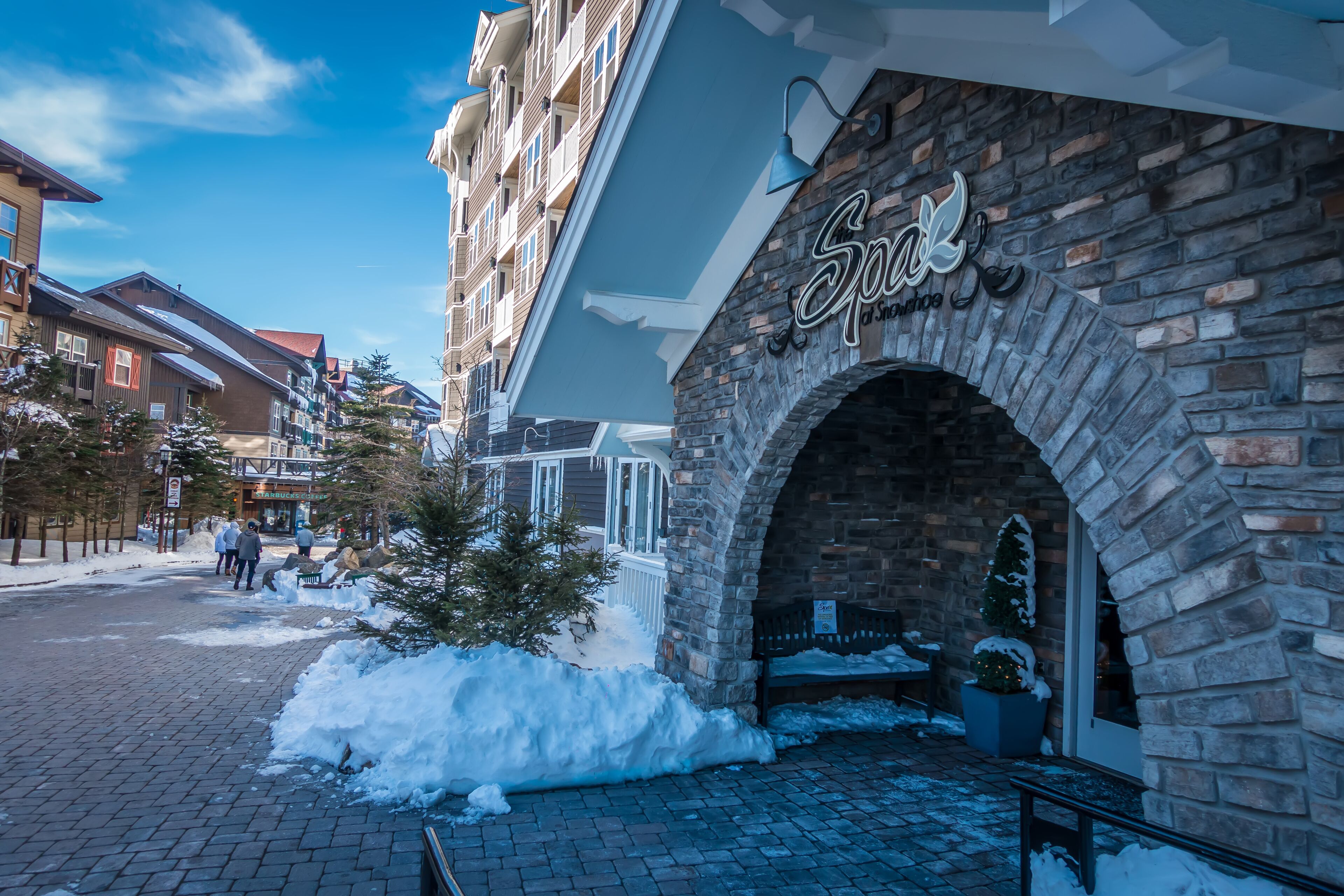 snowshoe mountain village and restaurants and shops on a sunny day