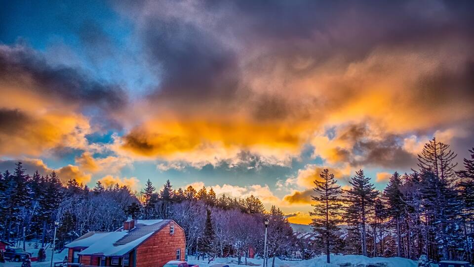 beautiful sunrise over horizon on snowshoe mountain west virginia
