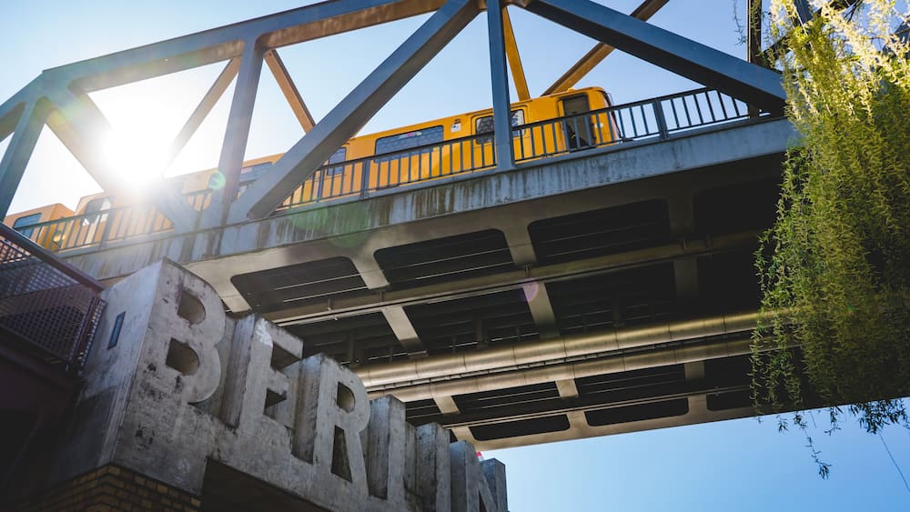 train passing by on a bridge in berlin