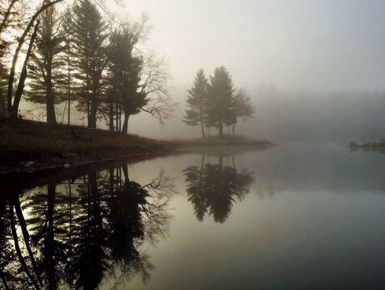 Early morning fog on a glacial lake at Canoe Bay, Wisconsin.

#Wisconsin #USA #travel