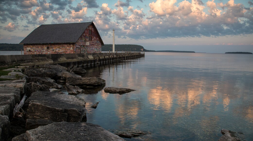 Striking sunrise sky over Anderson Boathouse. Door County Ephraim Wisconsin.