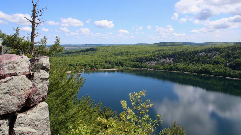 Wisconsin ice age nature background. Spring landscape at Devils Lake State Park, Baraboo area, Wisconsin, USA. Scenic view from East Bluff trail on the lake and north shore.