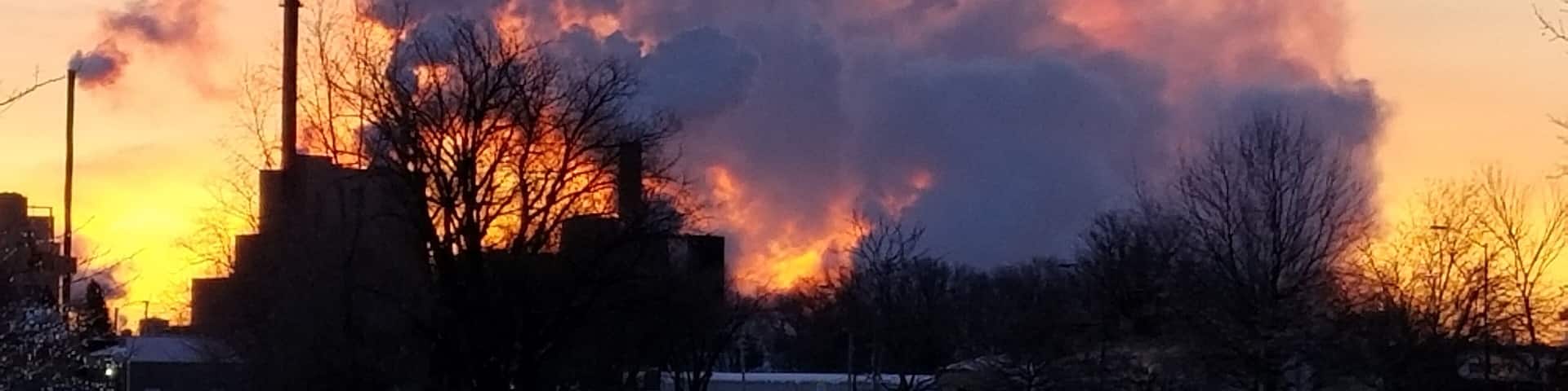 The sun rising behind the steam from the local paper mill resulted in some beautiful colors this cold winter morning.