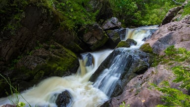 Wisconsin Waterfall. Long Slide Falls is one of several waterfalls in Marinette County Wisconsin. Marinette is also dubbed the waterfall capitol of Wisconsin.