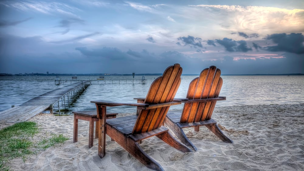 High Dynamic Range HDR Photo of wooden beach chairs along Lake Mendota at dusk Madison, Wisconsin
