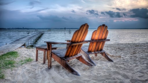 High Dynamic Range HDR Photo of wooden beach chairs along Lake Mendota at dusk Madison, Wisconsin